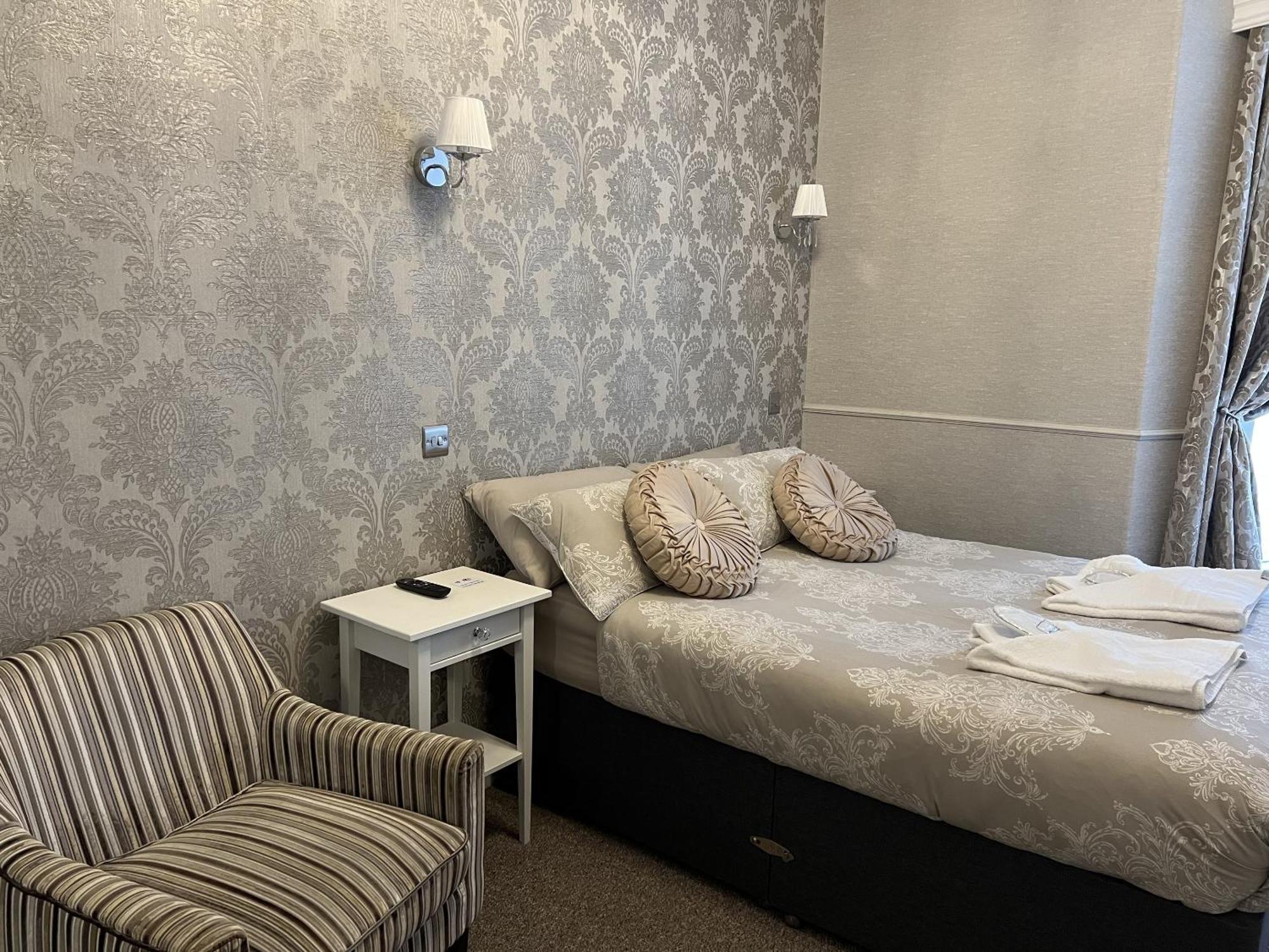 Tanes Hotel Cardiff Rum bild