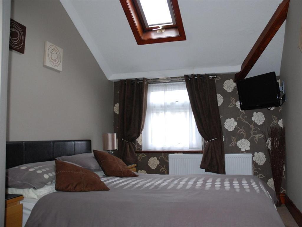 Tanes Hotel Cardiff Rum bild
