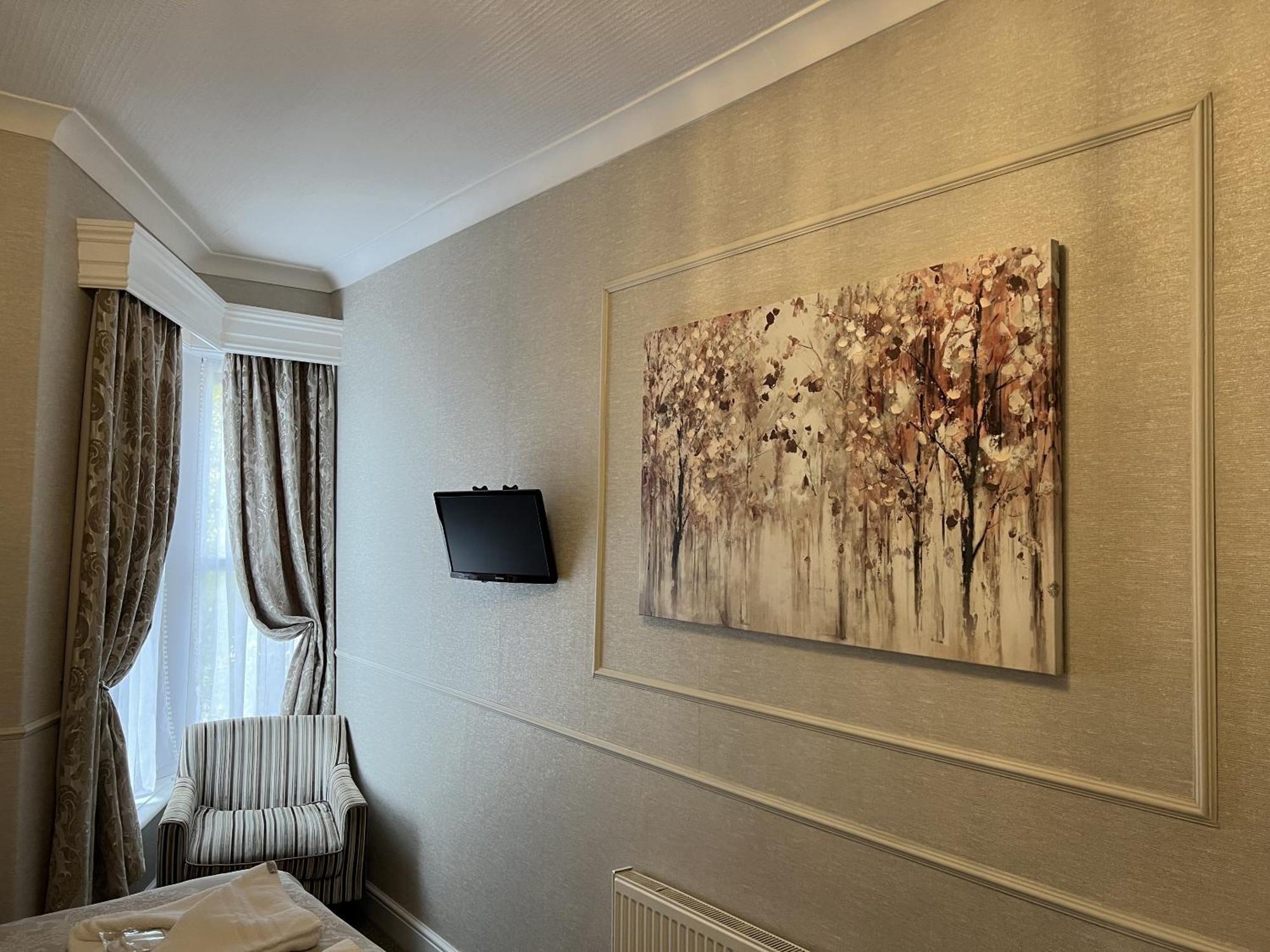 Tanes Hotel Cardiff Rum bild